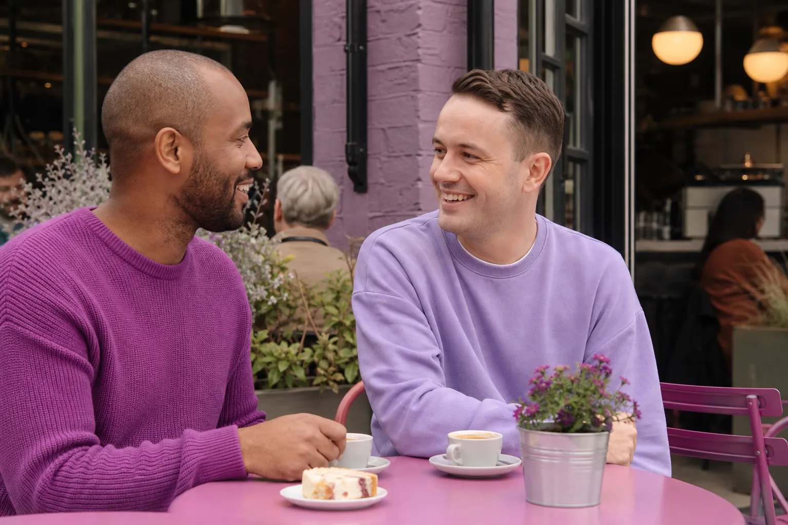 Two men talking over coffee in Aylesbury town centre