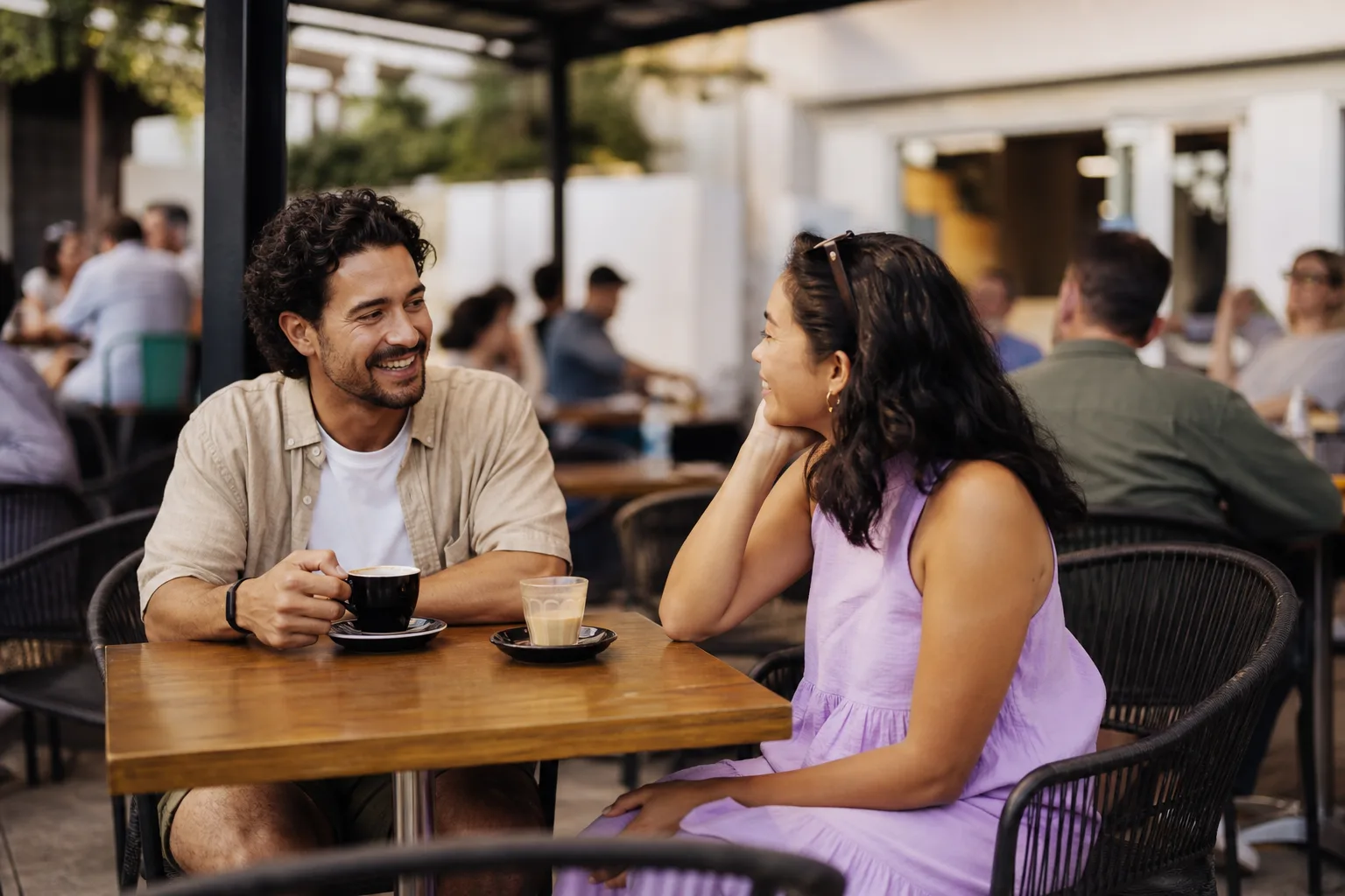 Two people meeting for coffee in a Northumberland market town